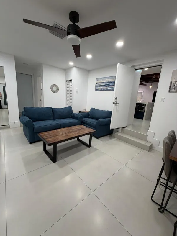 The same living room tidy and clean after the turnover